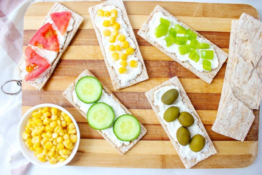 Quick and Easy Healthy Lunch Recipes | 5-Minute Meals for Busy Days 2 Healthy Lunch Recipes: Quick and easy healthy lunch recipe featuring crispbread topped with fresh vegetables, including tomatoes, cucumber, olives, and corn.