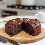 Chocolate Protein Cake – The Delicious Way to Boost Your Protein Intake 8 moist chocolate protein cake sliced on a board