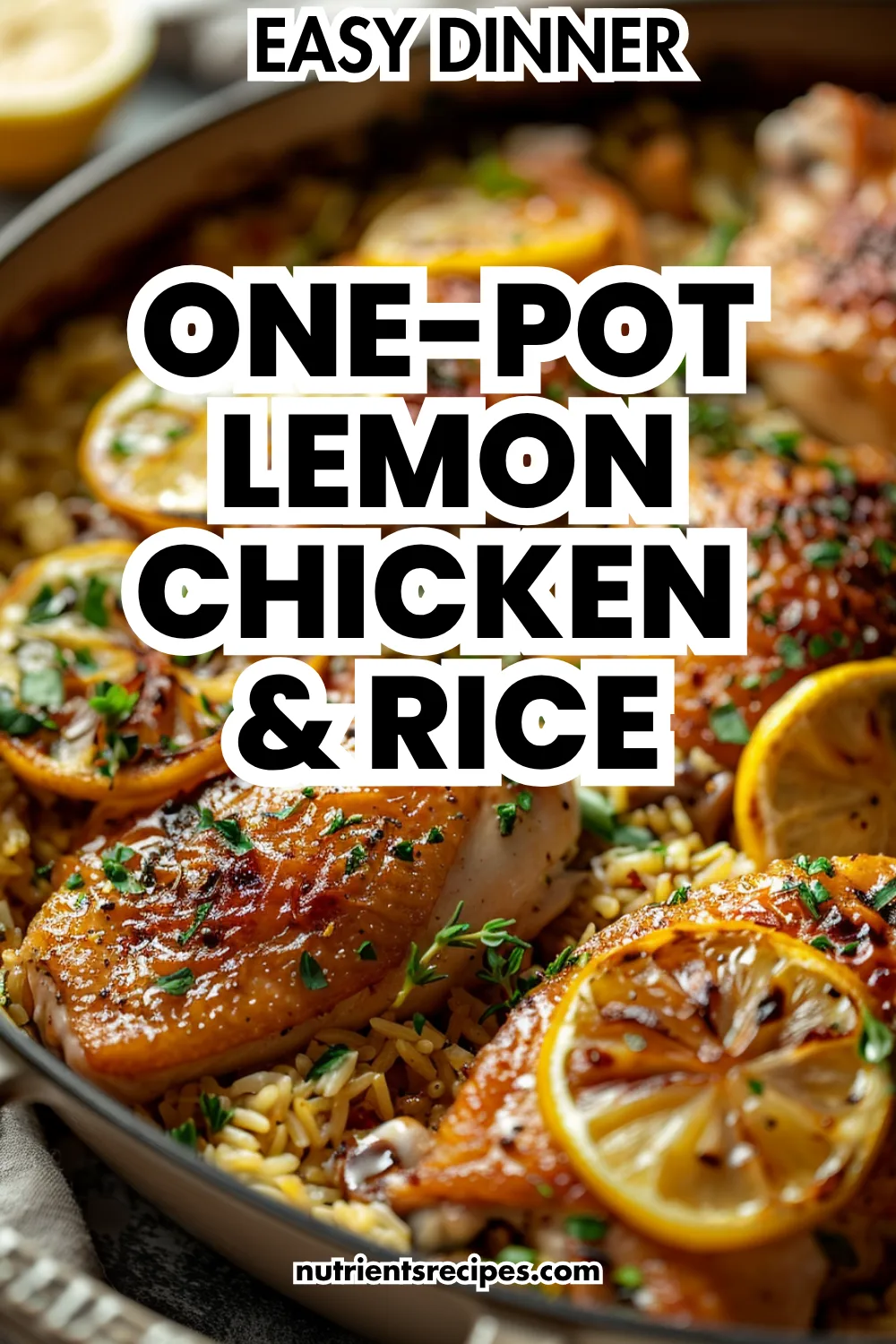 Skillet with lemon chicken and rice, topped with lemon slices and herbs—easy dinner.