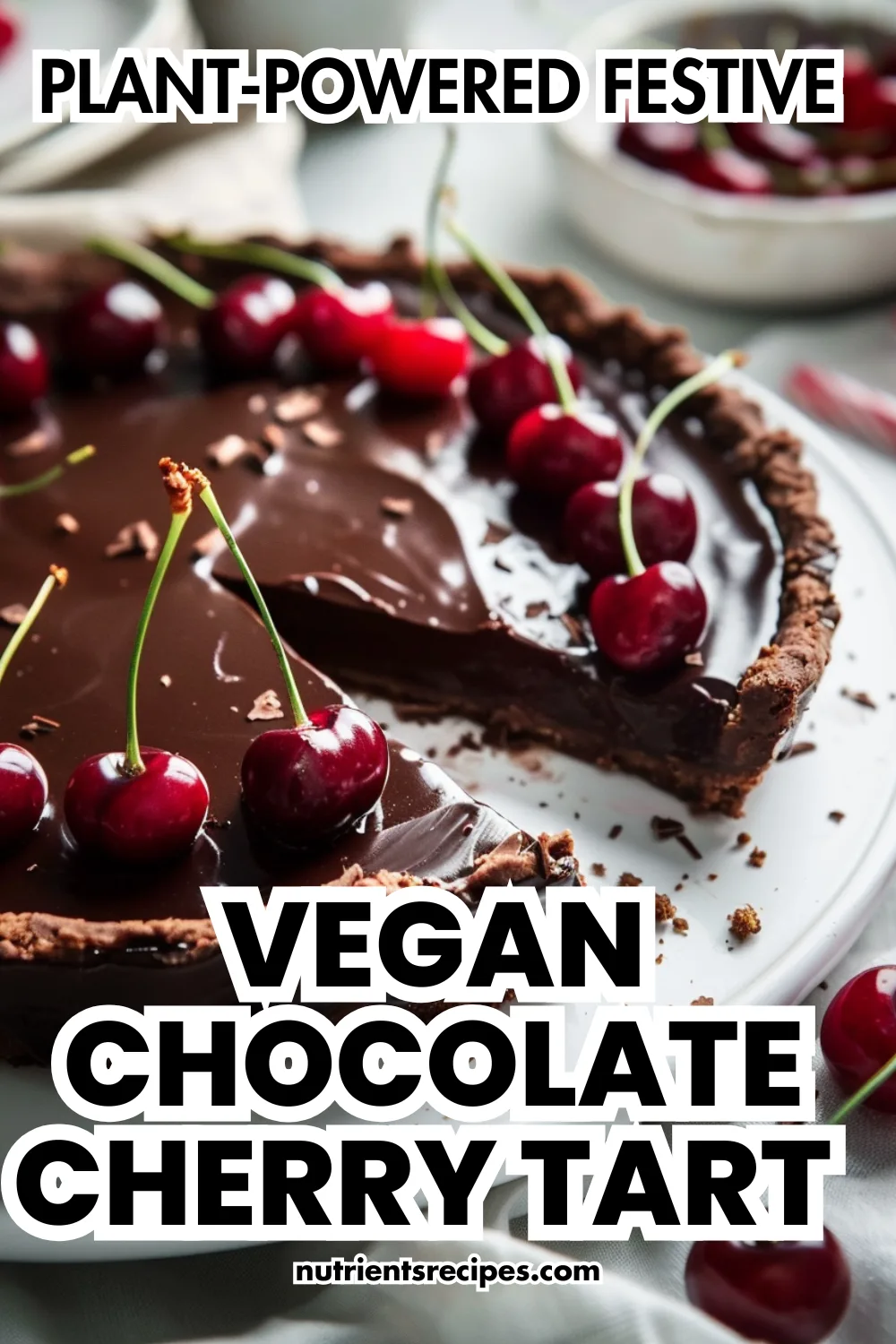 Vegan chocolate cherry tart with dark chocolate ganache and fresh cherries—plant-powered festive dessert
